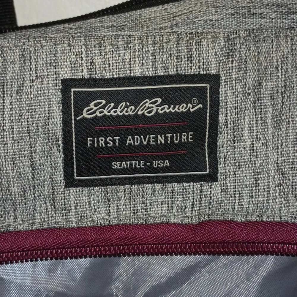 Eddie Bauer diaper bag with many compartment including insulated side pocket